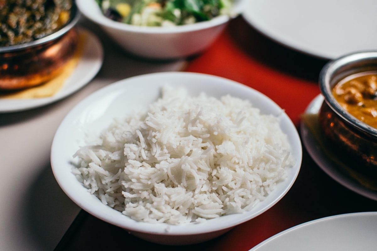 A bowl of freshly steamed white rice, cooled and ready to be turned into sinangag